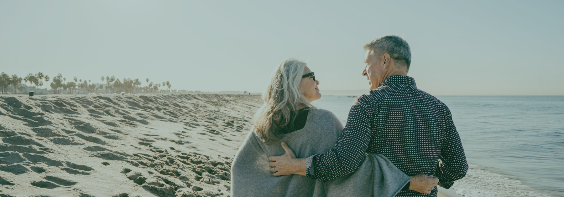 Couple Walking on Beach